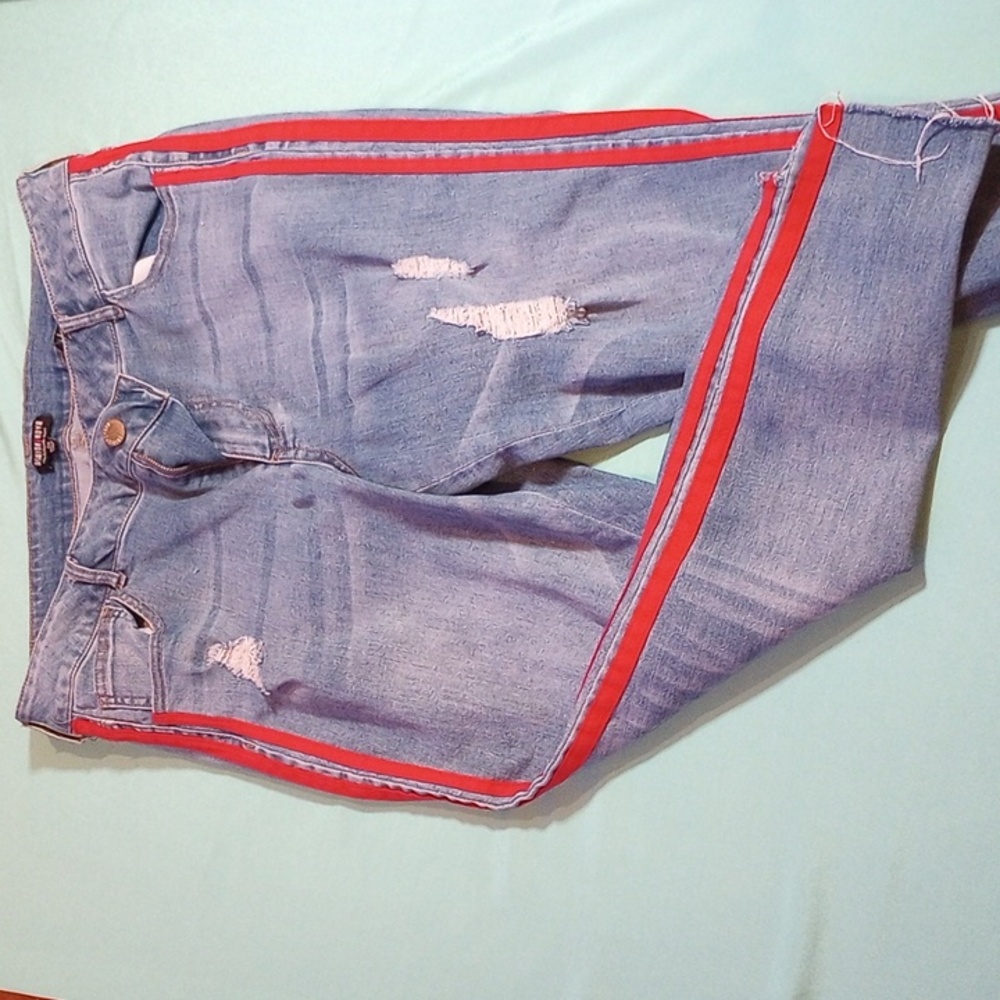 FASHION NOVA jeans with red stripe on side